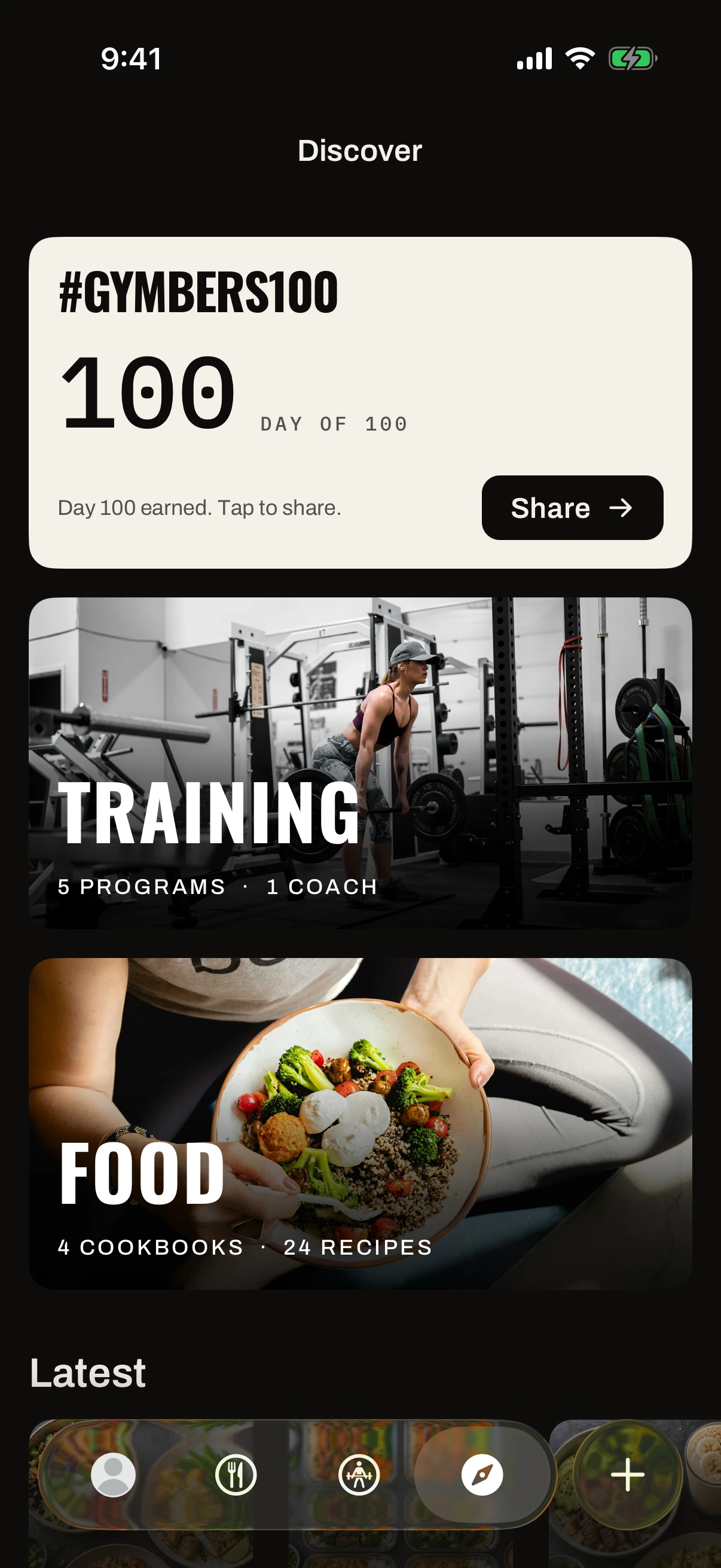 The Discover tab in the Gymbers app: a Training tile for programs and a Food tile for cookbooks and recipes.